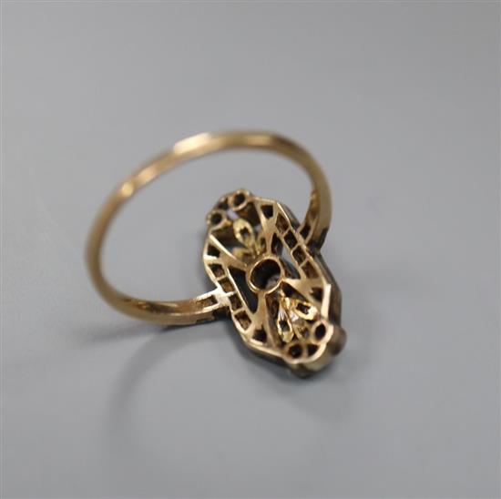 A 1920s? Austrian pierced yellow metal, diamond and sapphire set upfinger dress ring, size Q, gross 4.1 grams,